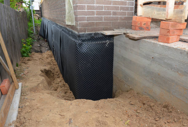 Happy homeowners after waterproofing job in Crothersville